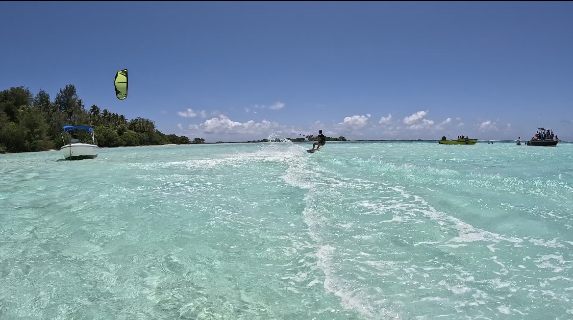 Bright lagoon with boats and turquoise water